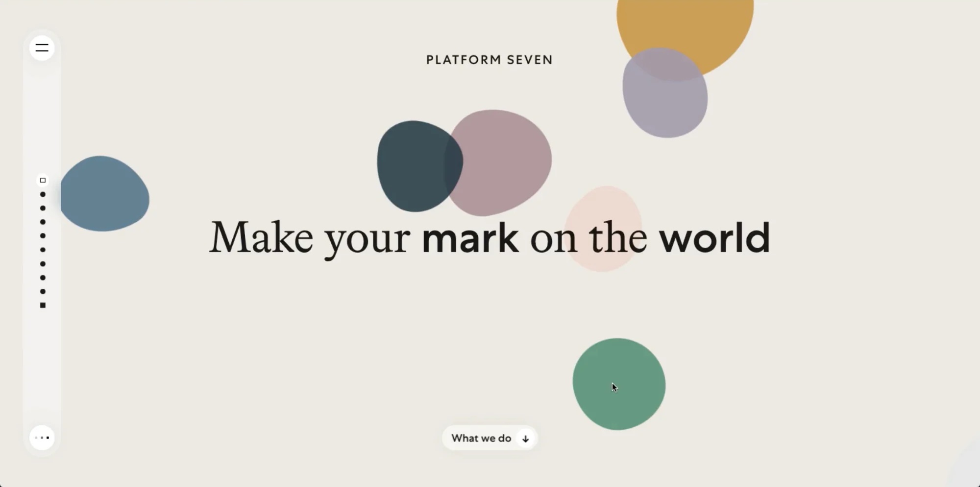 A landing page that says Make Your mark On The World and colored blobs scattered on the page