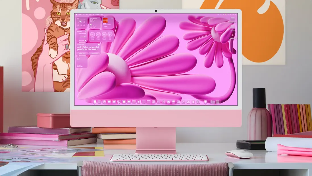 一台 iMac 上顯示着設計一新的主屏幕。